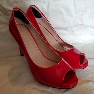 Red peep toe pumps